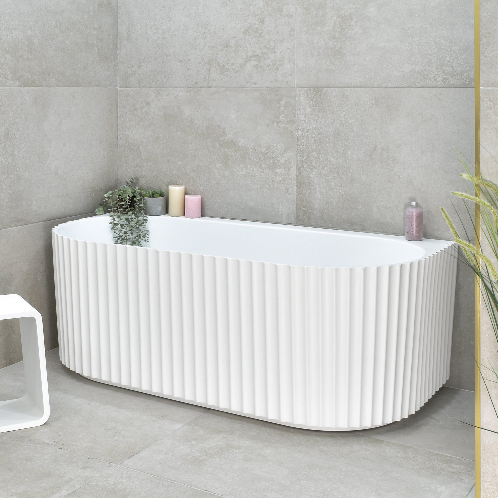 Agora Groove 1500mm back to wall bathtub in matte white, angled front view