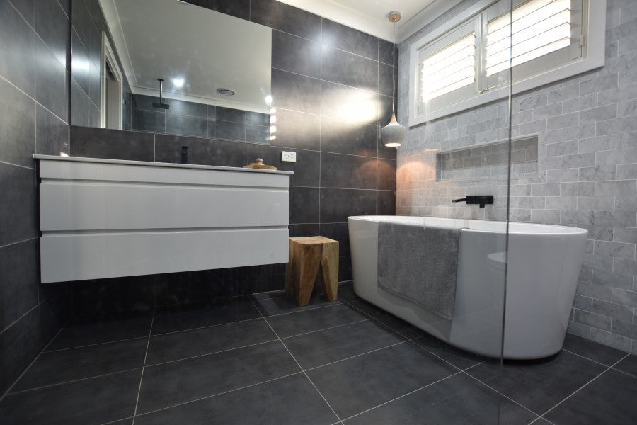 #42 - Bathrooms: Sandy's rich carrara marble blended with charcoal is something special
