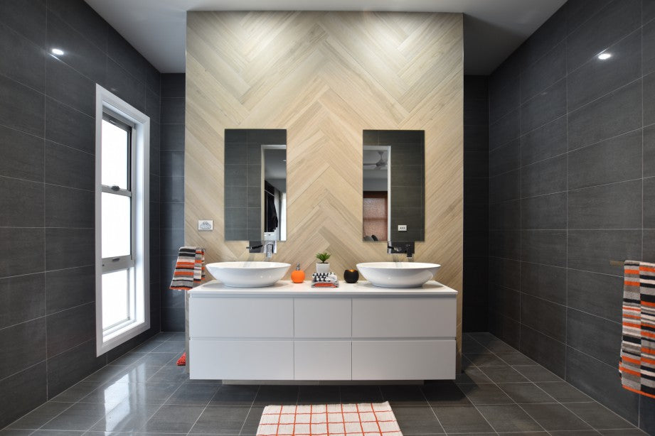#51 - Bathrooms: Dark black with a stunning light herringbone feature and concealed toilet + shower