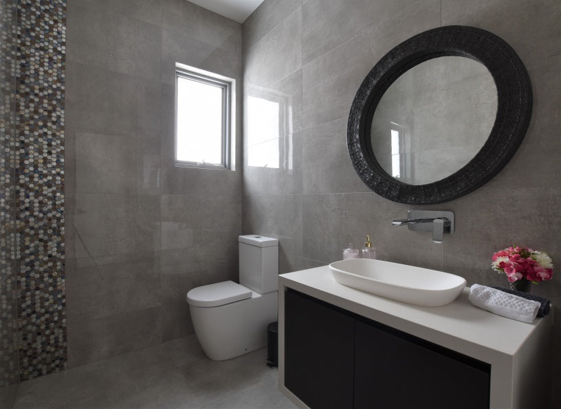 #79 - Bathrooms: Peek the all-wrapped look vanity and cute round feature mirror