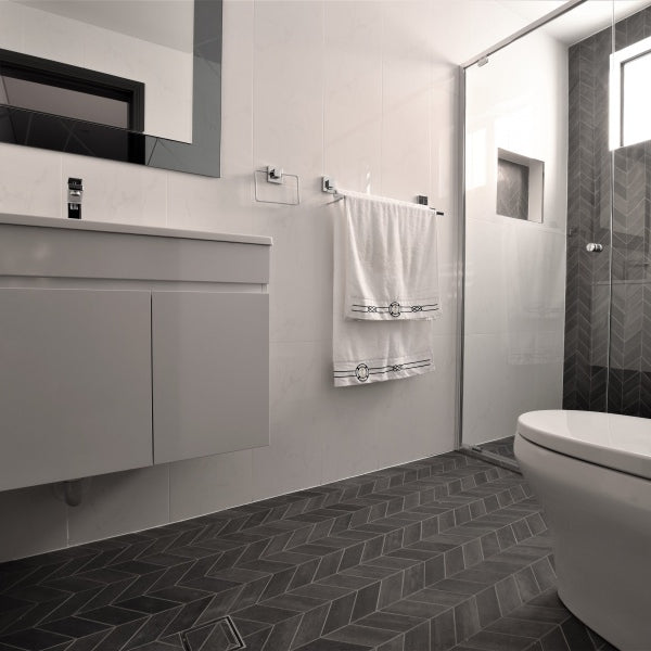 #85 - Bathrooms: Chevron (arrow) mosaics run throughout the floor and a feature wall
