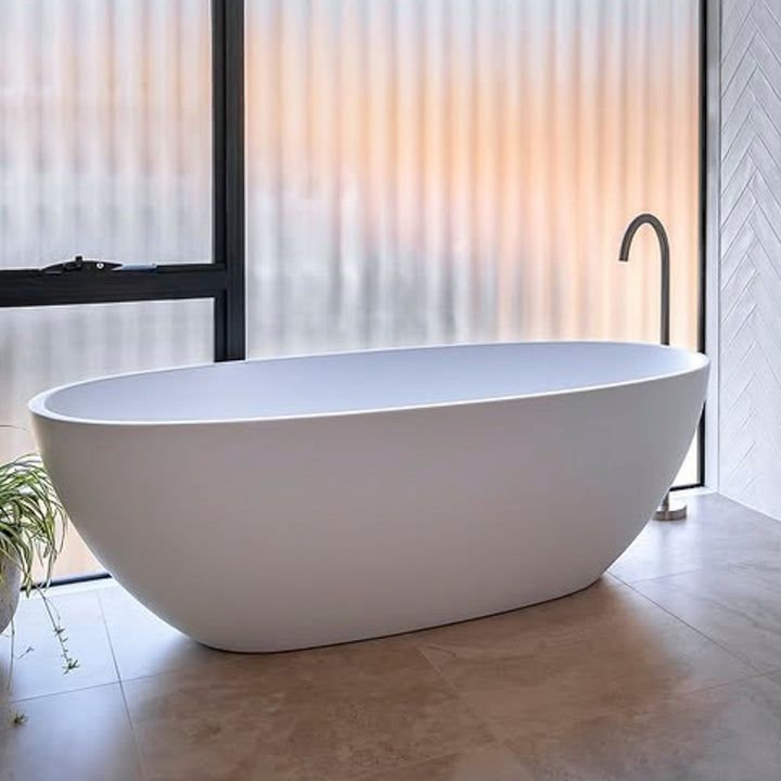 Clearance freestanding bath in modern bathroom setting