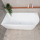Arco 1600mm left corner bathtub in matte white, top down view