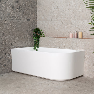 Arco 1500mm left corner bathtub in gloss white, angled front view