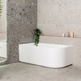 Arco 1500mm left corner bathtub in matte white, angled side view