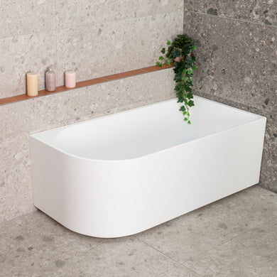Arco 1500mm right corner bathtub in matte white, top down view