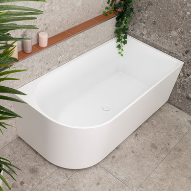 Arco 1500mm right corner bathtub in matte white, angled top down view