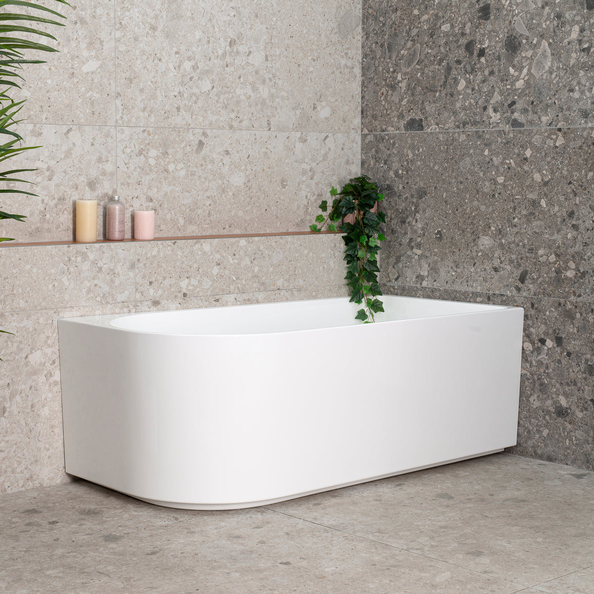 Arco 1500mm right corner bathtub in matte white, angled side view