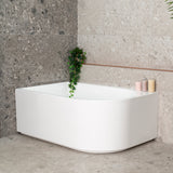 Arco Plus 1400mm left corner bathtub in gloss white, angled front view
