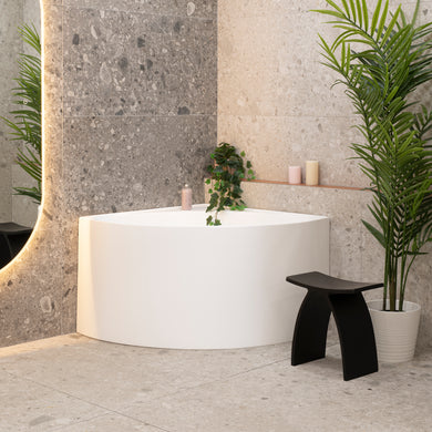 Angie corner 1000mm freestanding bathtub in matte white, angled front view