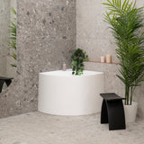 Angie corner 800mm freestanding bathtub in matte white, angled front view