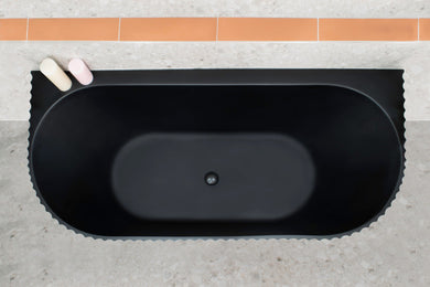 Agora Groove 1500mm back to wall bathtub in matte black, top view