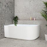 Agora Groove 1700mm left corner bathtub in gloss white, angled front view
