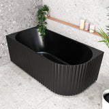 Agora Groove 1500mm left corner bathtub in matte black, angled top down view