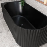 Agora Groove 1500mm left corner bathtub in matte black, top down view