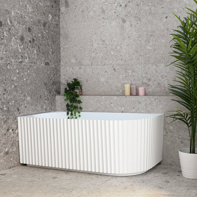 Agora Groove 1500mm left corner bathtub in matte white, angled front view