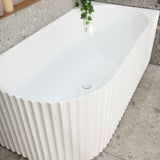 Agora Groove 1500mm right corner bathtub in gloss white, zoomed top down view