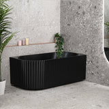 Agora Groove 1500mm right corner bathtub in matte black, angled side view