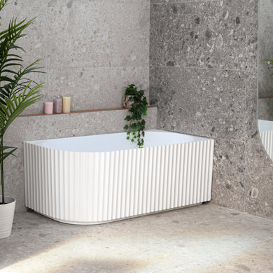 Agora Groove 1500mm right corner bathtub in matte white, angled side view
