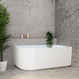 Agora Groove 1500mm right corner bathtub in matte white, angled front view