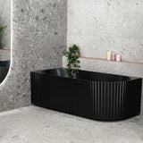 Agora Groove 1700mm left corner bathtub in matte black, angled side view