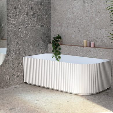 Agora Groove 1700mm left corner bathtub in matte white, angled side view