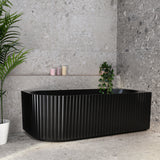 Agora Groove 1700mm right corner bathtub in matte black, angled front view