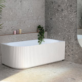 Agora Groove 1700mm right corner bathtub in matte white, angled side view