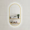 Pill Oval 500mm x 1000mm Backlit LED Framed Mirror with Demister, Brushed Brass (Gold) Frame