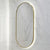 Pill Oval 500mm x 1000mm Backlit LED Framed Mirror with Demister, Brushed Brass (Gold) Frame