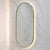 Pill Oval 500mm x 1000mm Backlit LED Framed Mirror with Demister, Brushed Brass (Gold) Frame