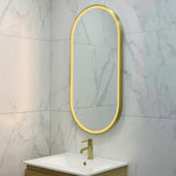 Pill Oval 500mm x 1000mm Frontlit LED Framed Mirror with Demister, Brushed Brass (Gold) Frame