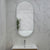 Pill Oval 500mm x 1000mm Frontlit and Backlit LED Frameless Mirror with Frosted Glass Border and Demister