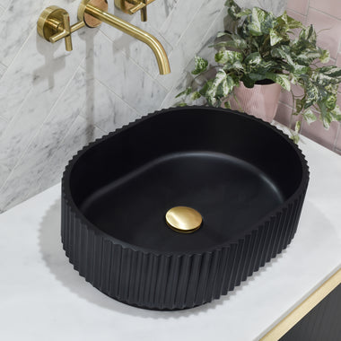 Fluted-oval-basin-black-stadio-groove-angled-view