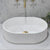 Stadio Groove 480mm Fluted Oval Artificial Stone Above-Counter Basin, Matte White
